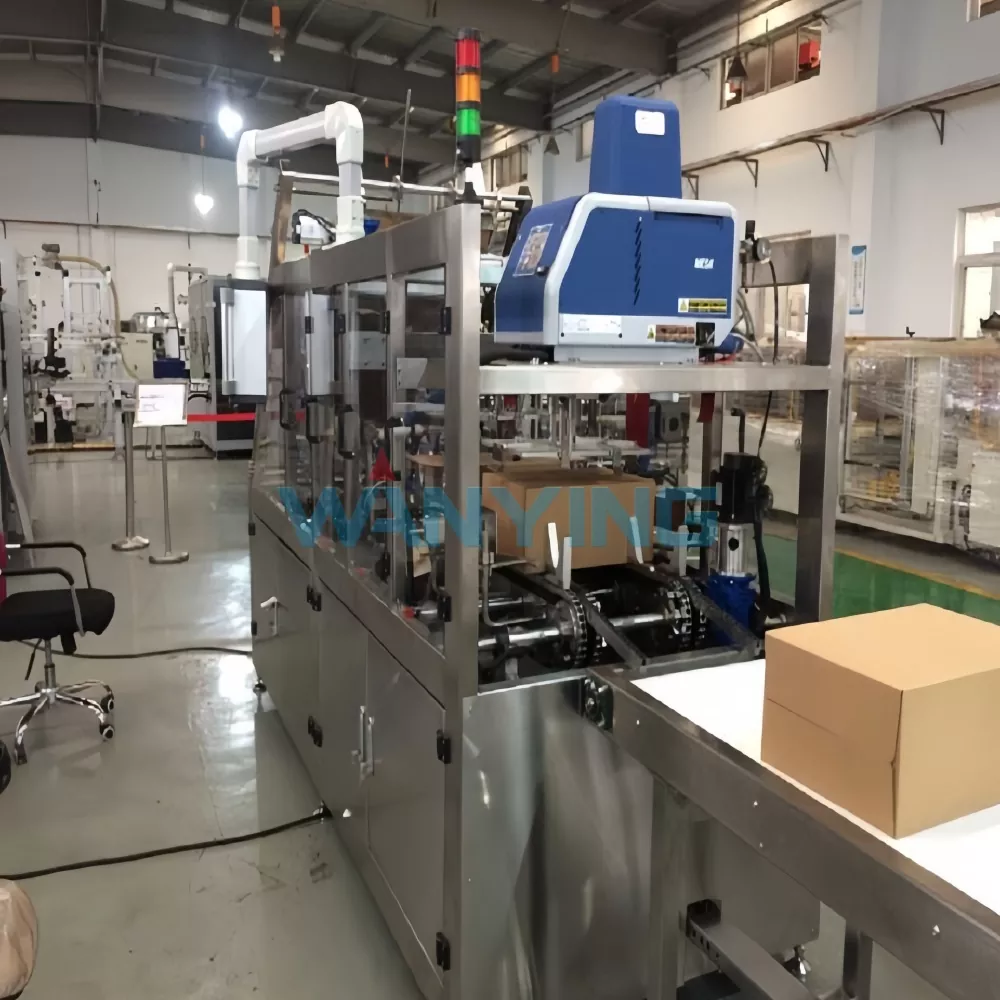 One-piece wrap-around case packer