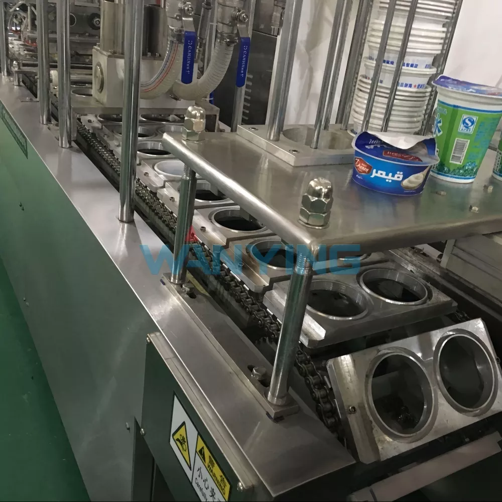 Pre-cut film filling and sealing machine