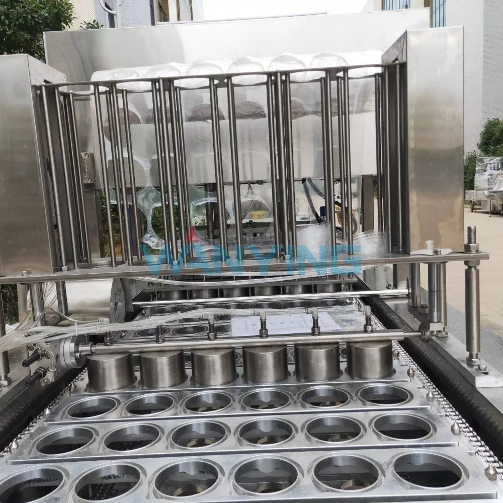 Pre-cut film filling and sealing machine