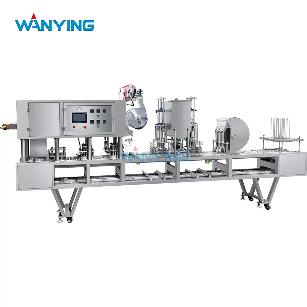 Reel-fed film filling and sealing machine